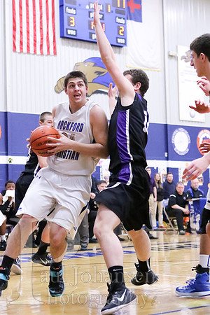 RC Boys Varsity Basketball vs Lutheran 2-24-2015-8230